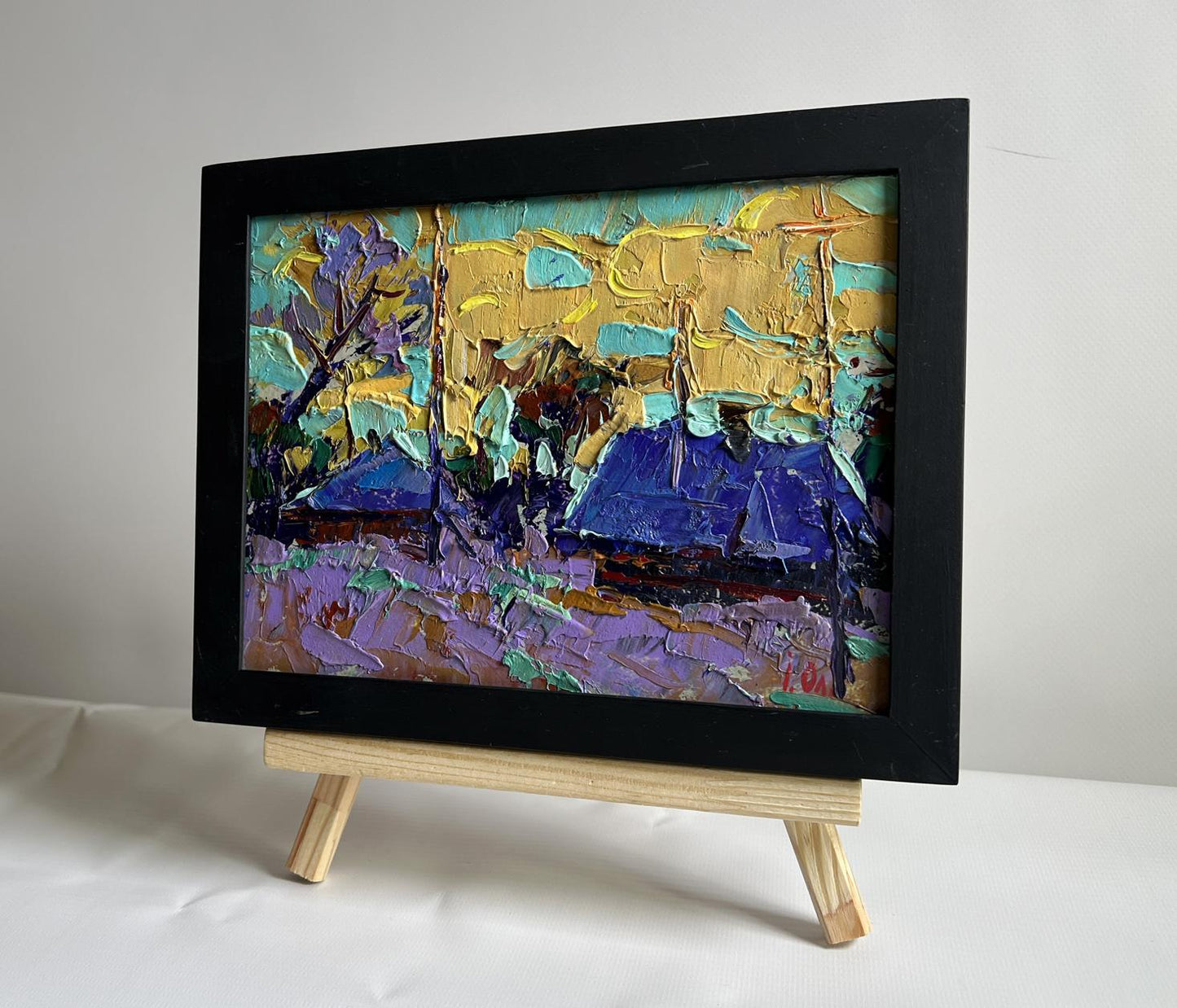 Oil painting Cold evening in the village by Oleksiy Ivanyuk in black frame