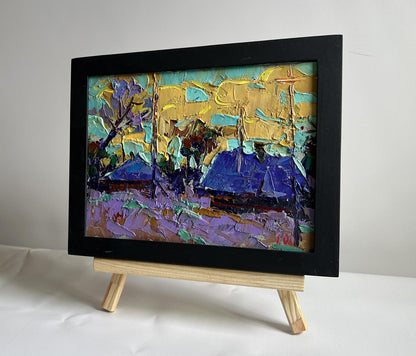 Oil painting Cold evening in the village by Oleksiy Ivanyuk in black frame