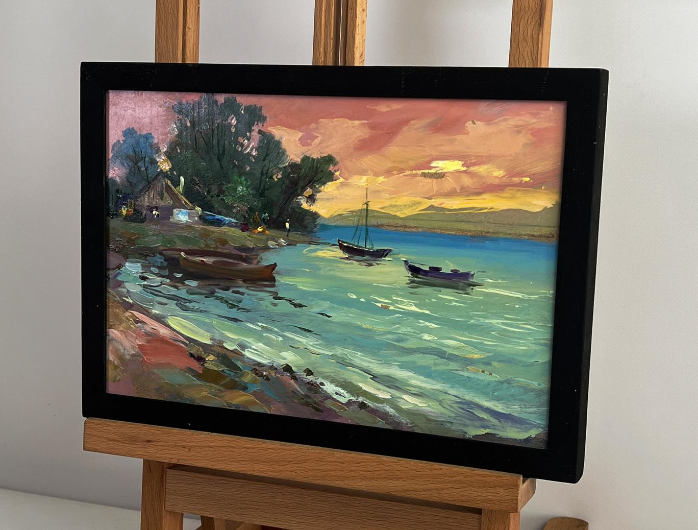 Oil painting Boats at Sunset by Yuriy Suprunchuk in black frame