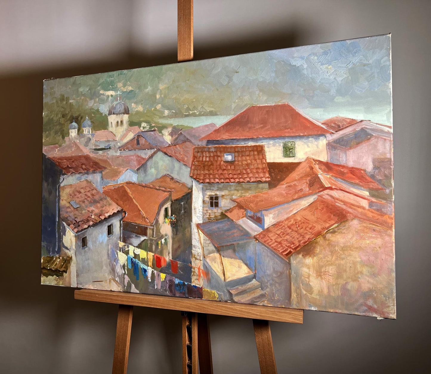 Oil painting Streets of the town Tatyana Derdey on wooden easel
