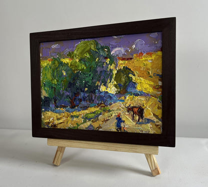 Impressionist oil painting Walking a cow in a field by Oleksiy Ivanyuk in wooden frame