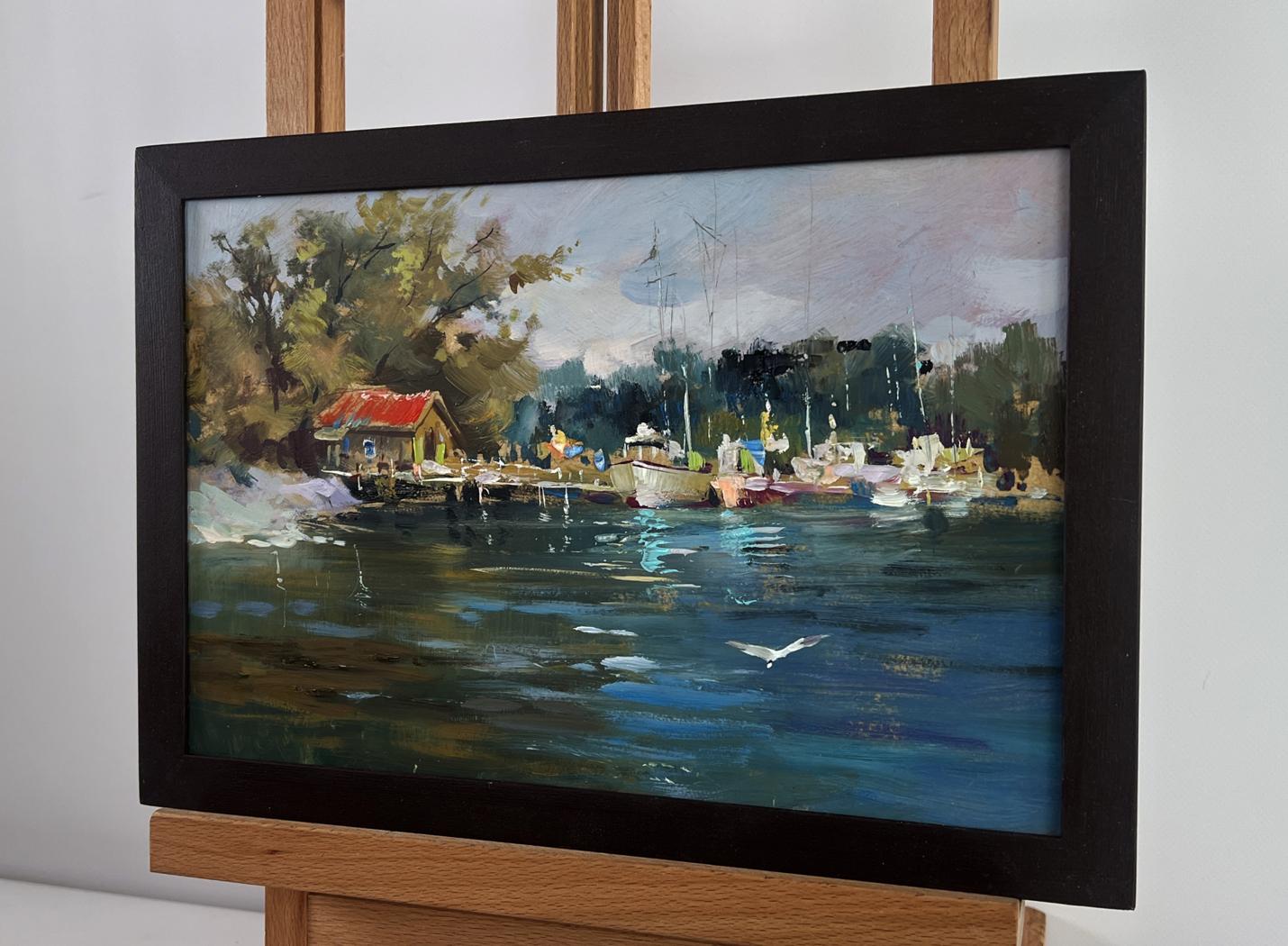 Framed oil painting of serene Small yacht club by Yuriy Suprunchuk