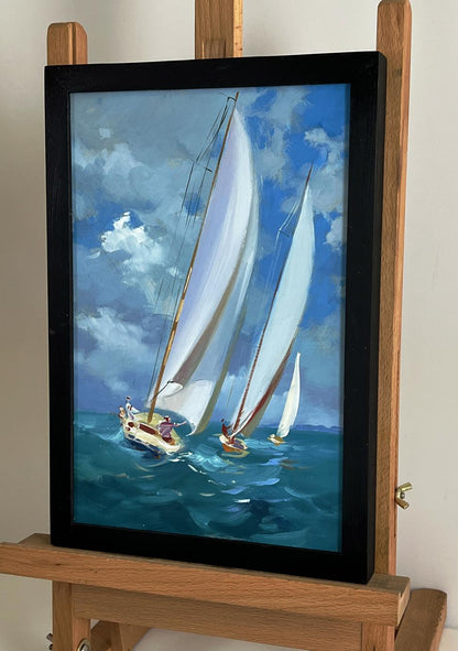 Oil painting of sailboats at sea by Yuriy Suprunchuk in black frame