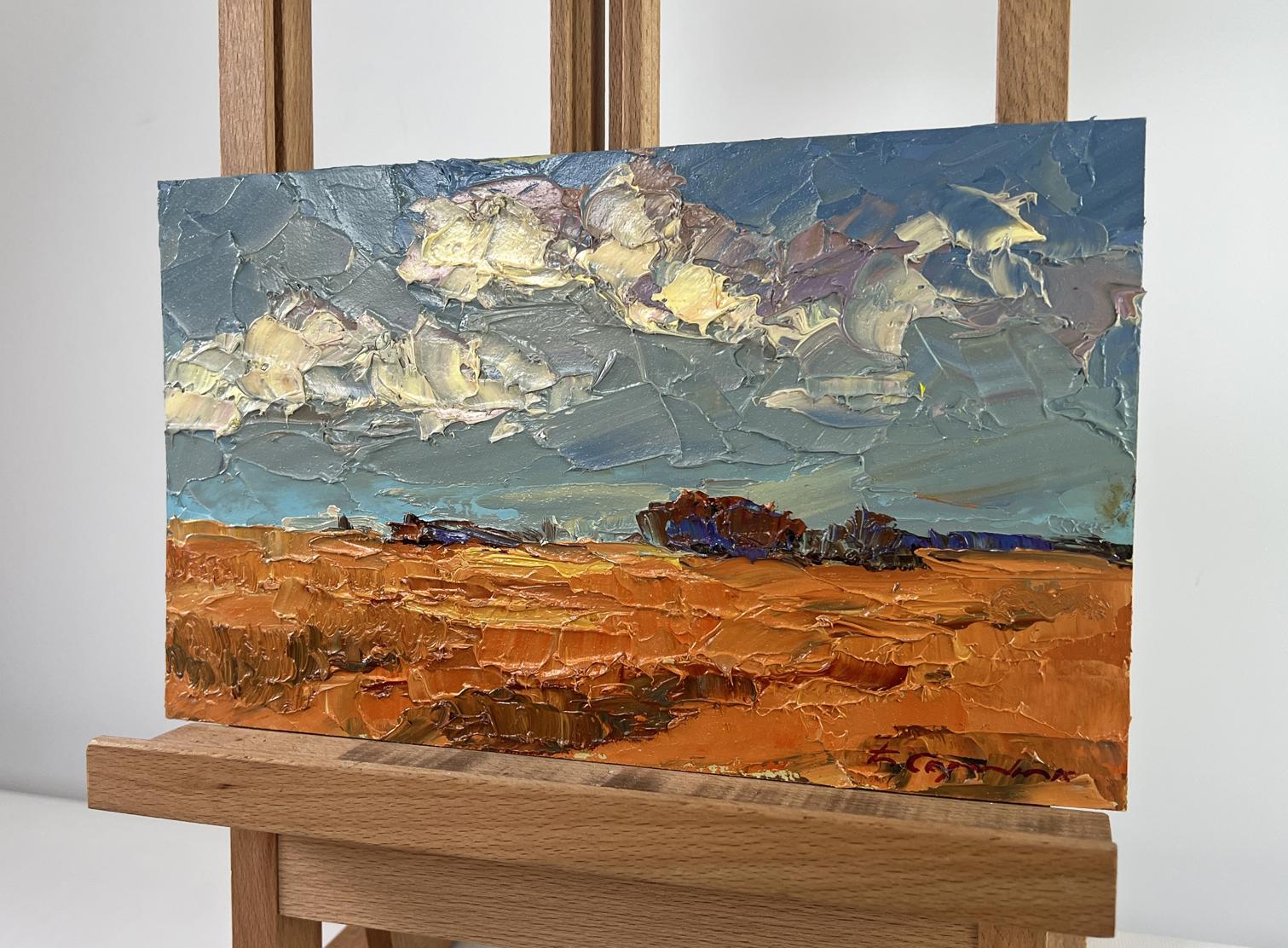 Oil painting Where there is bread there is a home by Boris Serdyuk, golden field under dramatic sky