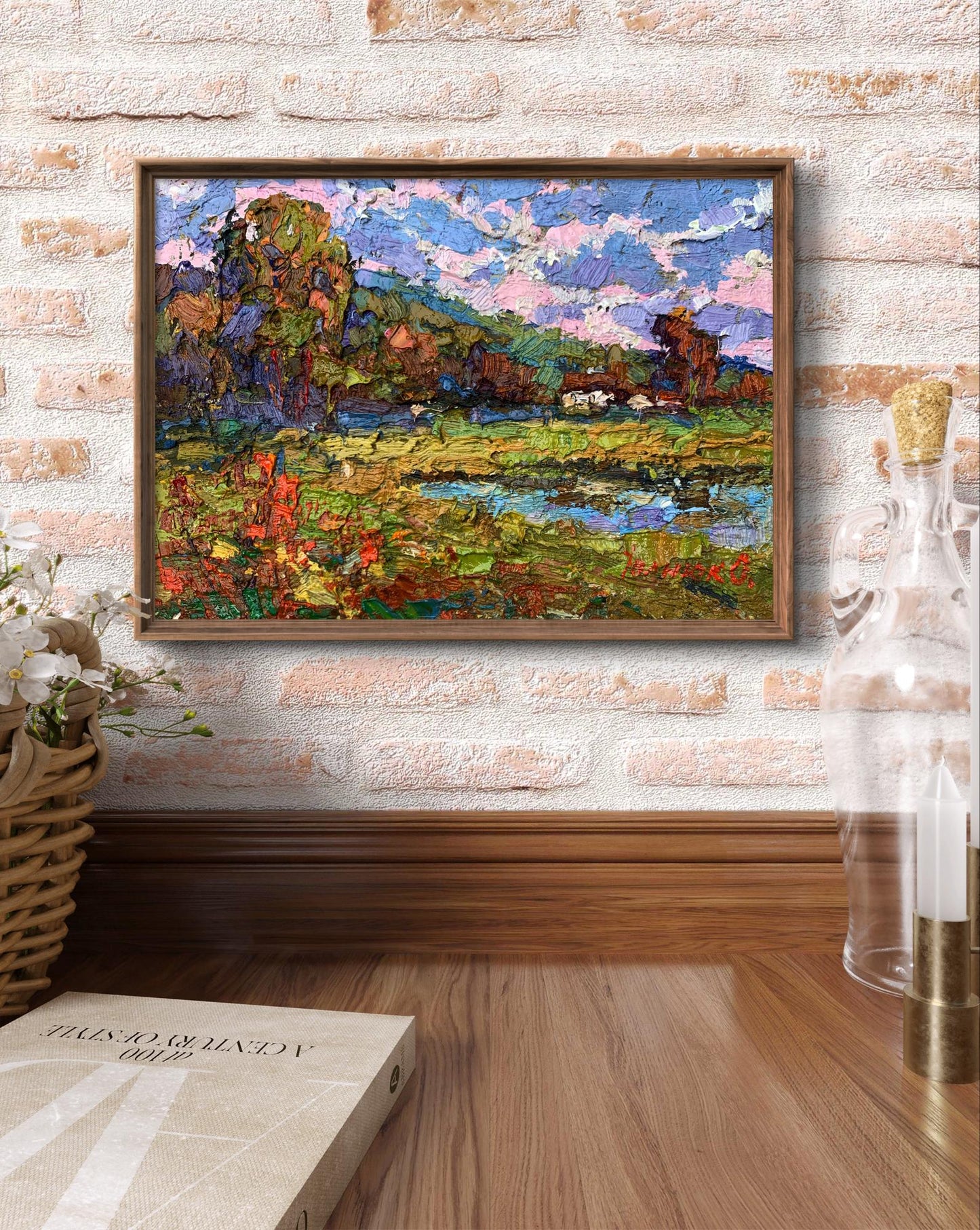 Oil painting On the edge of the village by Oksana Ivanyuk in wooden frame on brick wall