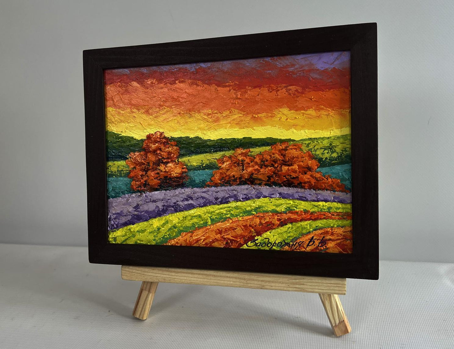 Oil painting Autumn sunset in the field by V. Zadorozhnya in black frame