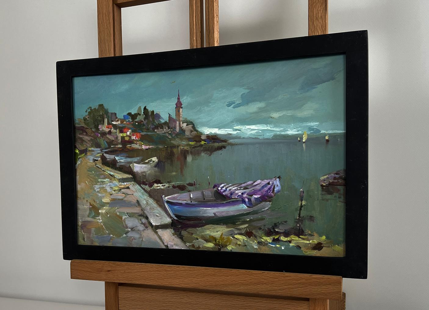 Framed oil painting of coastal village boats by Yuriy Suprunchuk
