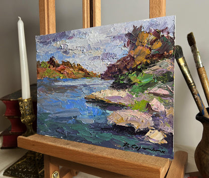 Oil painting Stone Coast by Boris Serdyuk, textured landscape with blue water and rocky shores