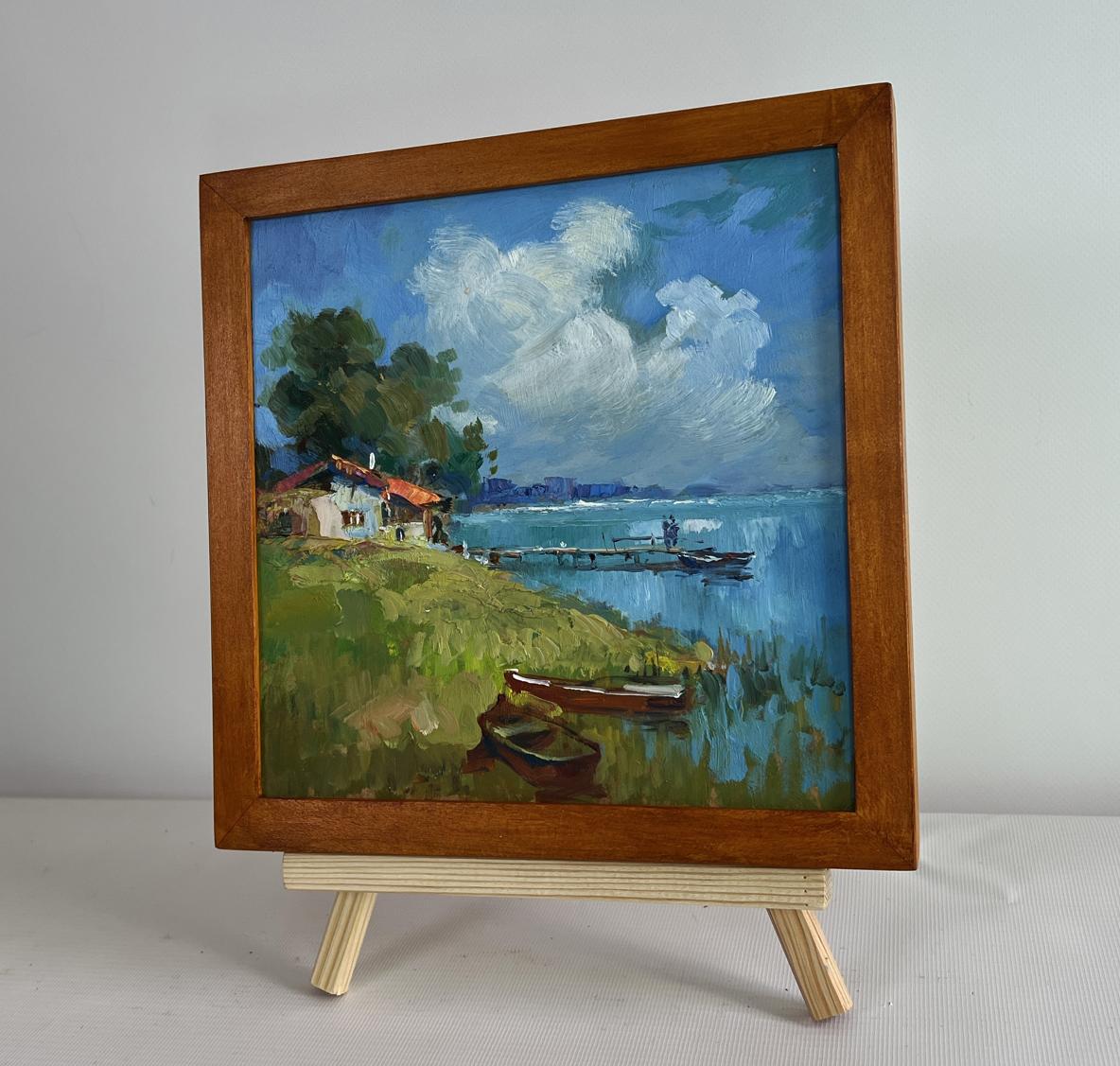 Oil painting of house near river by Yuriy Suprunchuk, lakeside scene