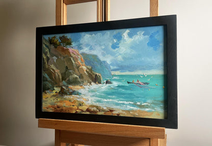 Framed oil painting by Yuriy Suprunchuk: boat sailing to rocky coastal shore