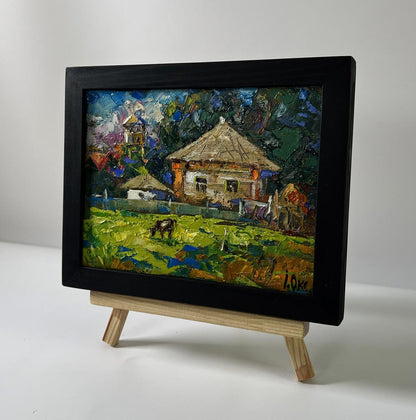 Oil painting Quiet village life by Oksana Ivanyuk in black frame
