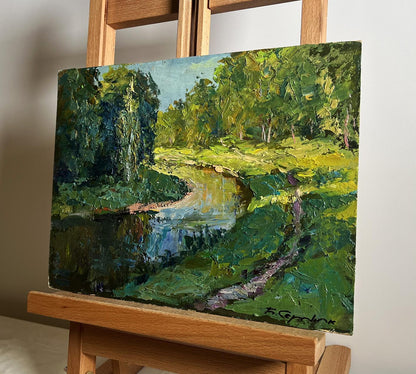 Vibrant impasto oil painting of forest along river by Boris Serdyuk