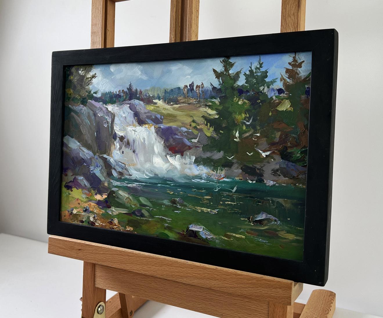 Black-framed oil painting of Mountain Waterfall by Yuriy Suprunchuk