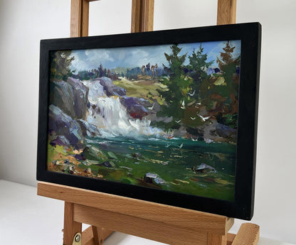Black-framed oil painting of Mountain Waterfall by Yuriy Suprunchuk