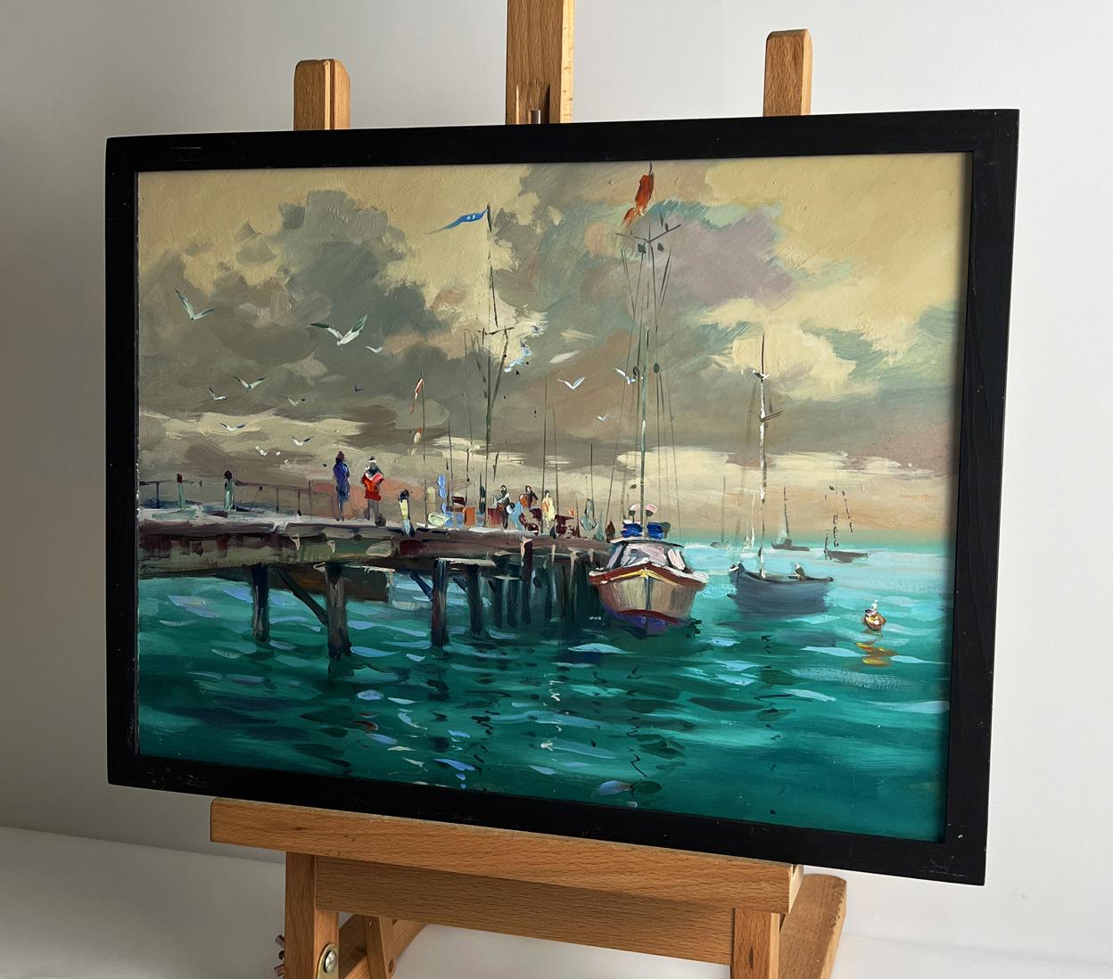 Framed oil painting of boats at pier by Yuriy Suprunchuk