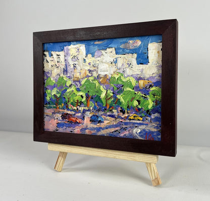 Oil painting Big city lights by Oleksiy Ivanyuk in dark wood frame