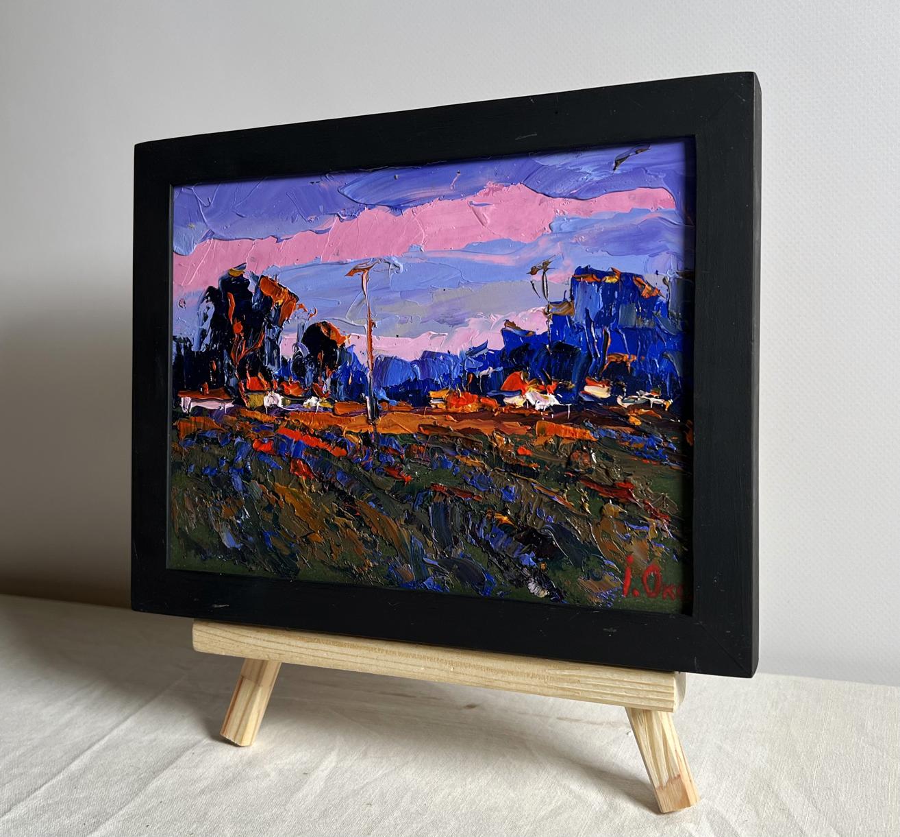 Vibrant pink sunset oil painting by Oksana Ivanyuk in black frame