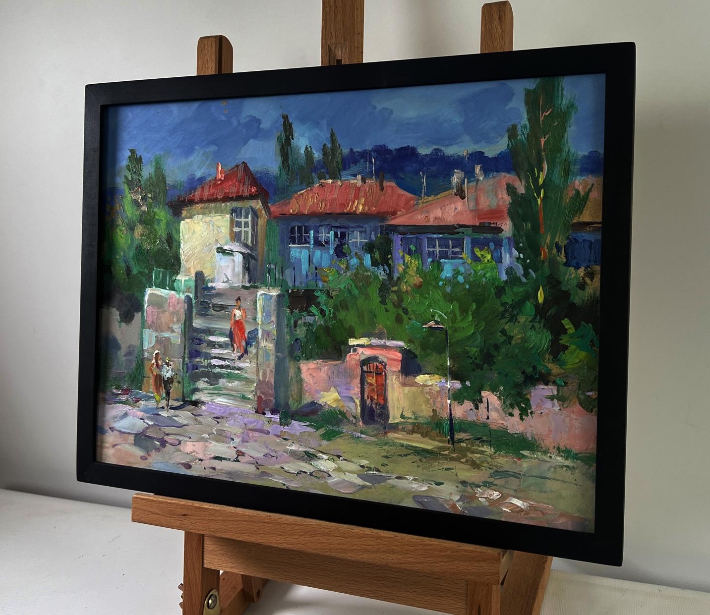 Framed oil painting by Yuriy Suprunchuk of old city street with stairs