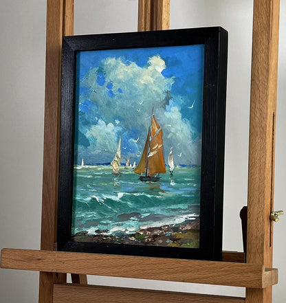 Oil painting of sailboats at sea by Yuriy Suprunchuk in black frame