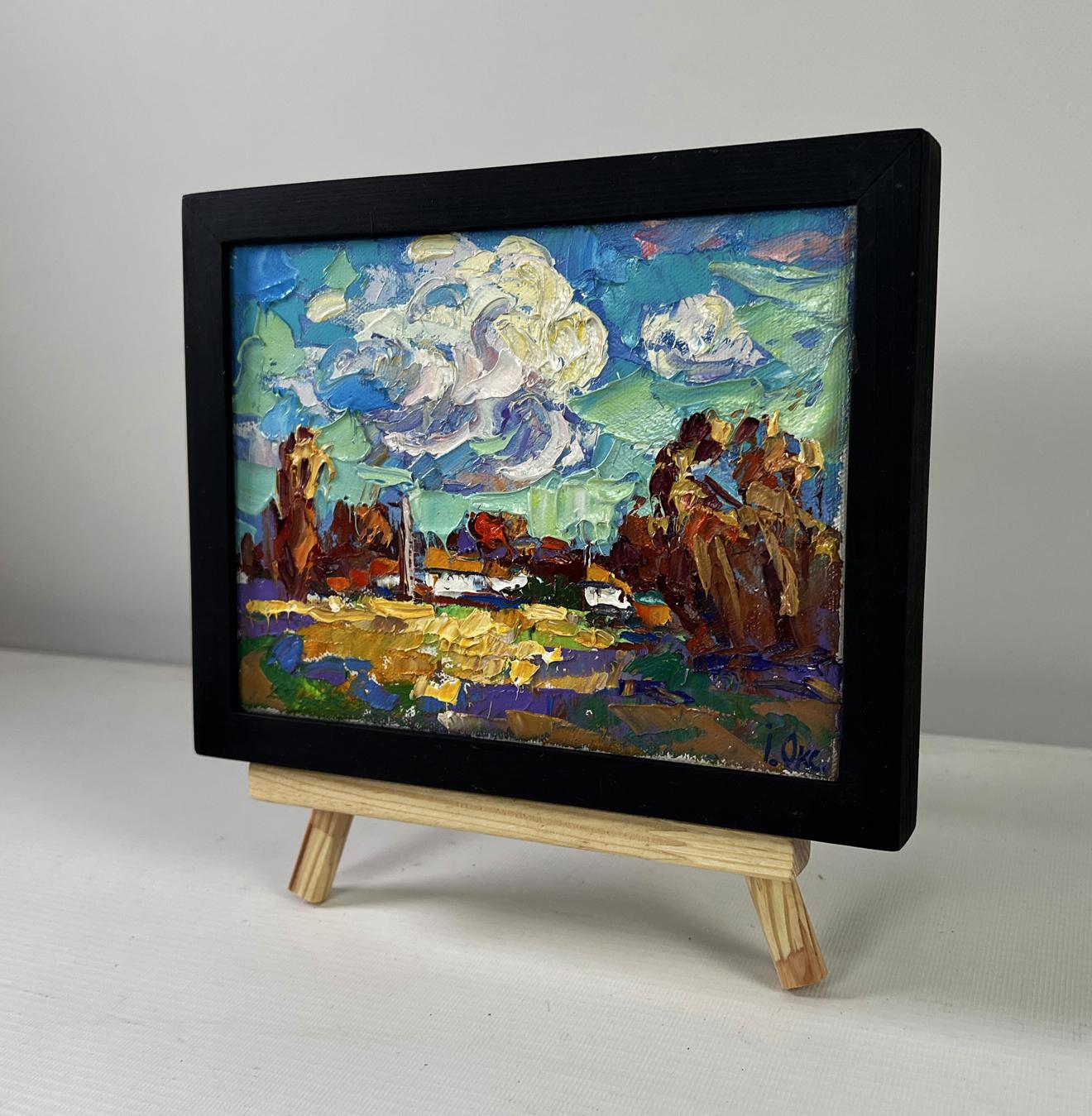 Oil painting Peace of the sky over the quiet earth by Oksana Ivanyuk in black frame