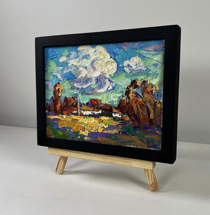 Oil painting Peace of the sky over the quiet earth by Oksana Ivanyuk in black frame