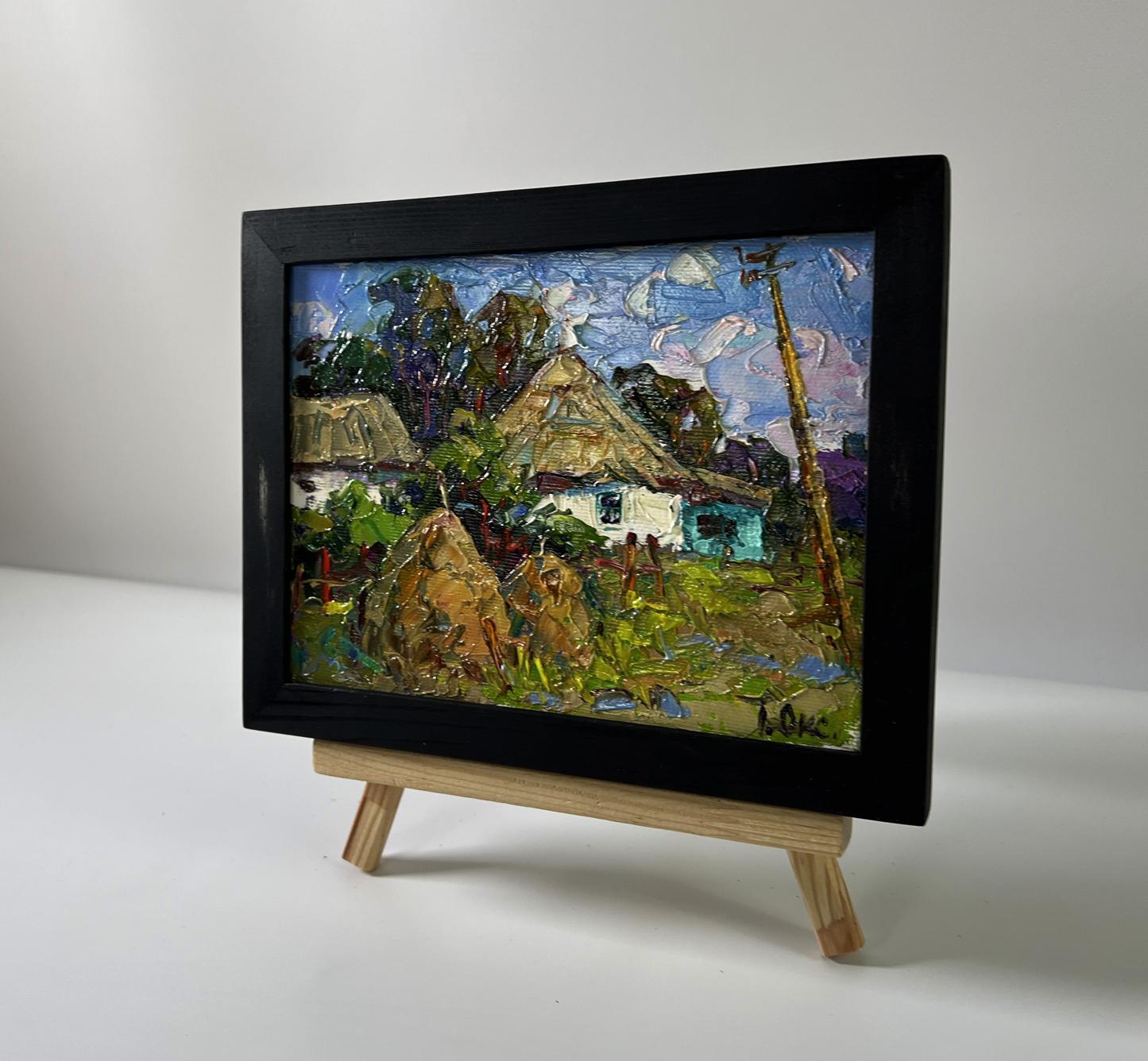 Oil painting Summer village by Oksana Ivanyuk on wooden easel