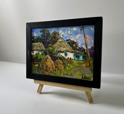 Oil painting Summer village by Oksana Ivanyuk on wooden easel