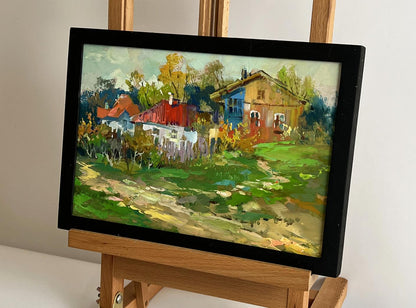 Framed impressionist oil painting of quiet village street by Yuriy Suprunchuk