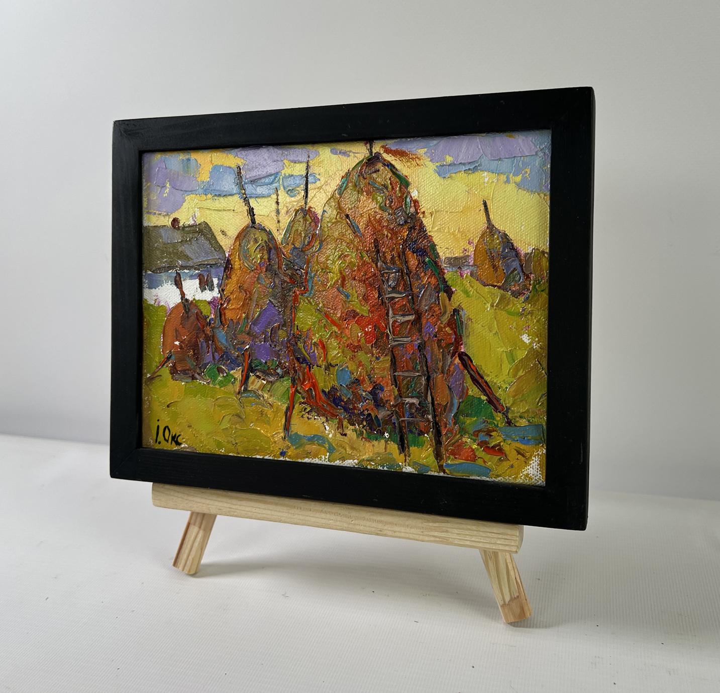 Oil painting When the light fades by Oksana Ivanyuk haystacks scene on easel