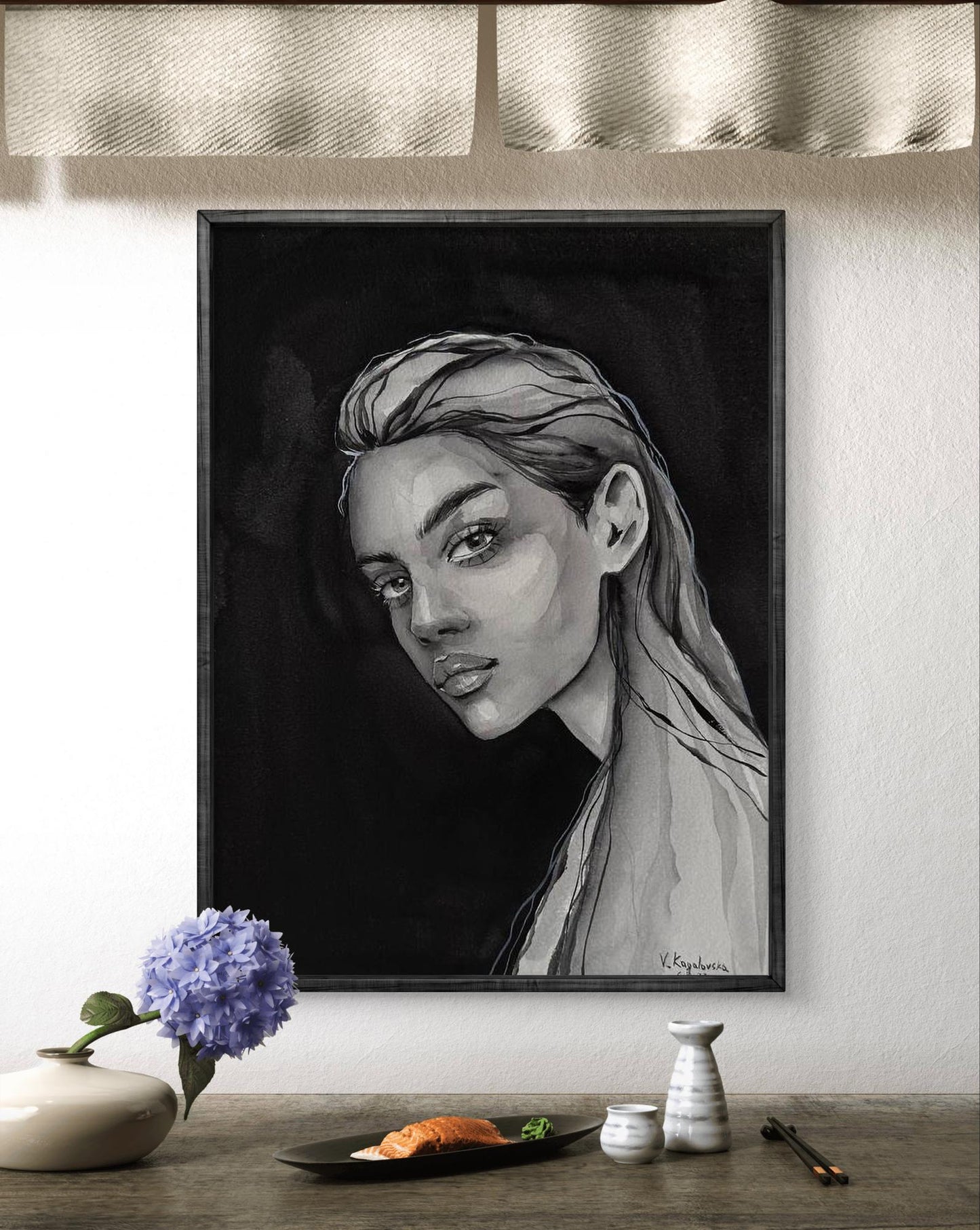 Black-framed grayscale portrait of woman by Victoria Kagalovska