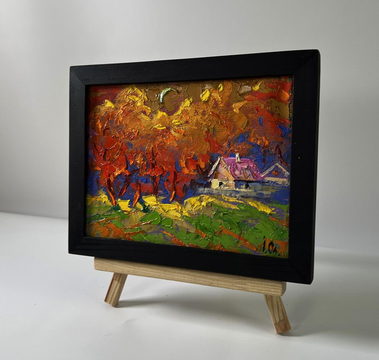 Oil painting by Oleksiy Ivanyuk: autumn trees in fiery orange leaves