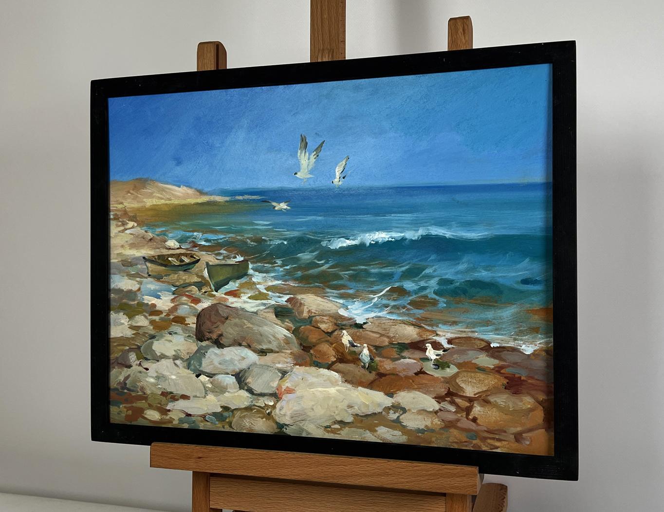 Framed oil painting of seagulls over turquoise waves by Yuriy Suprunchuk
