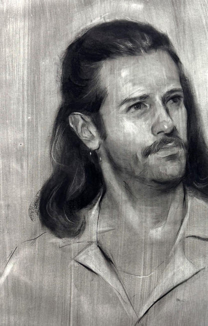 Detailed grayscale charcoal portrait sketch of Alessio Annam Butt