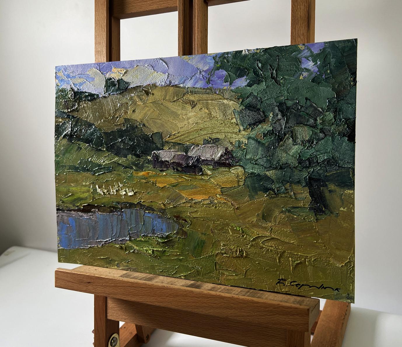 Oil painting by Boris Serdyuk: green hills, pond, trees under purple sky