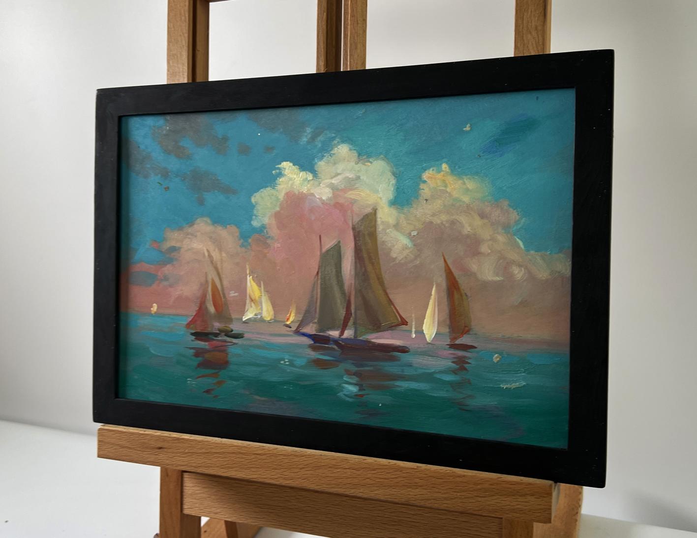 Oil painting Sunset at sea with ships by Yuriy Suprunchuk in black frame