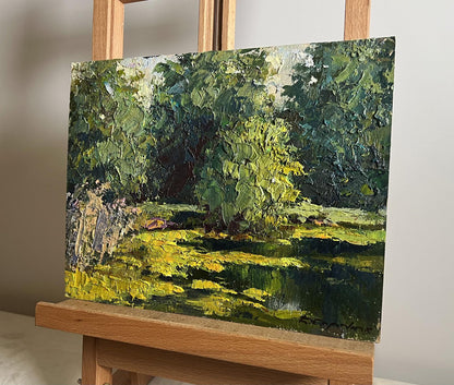 Oil painting In the forest pond by Boris Serdyuk, lush green foliage and water