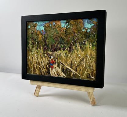 Oil painting Where the Reeds Whisper by Oleksiy Ivanyuk on wood easel