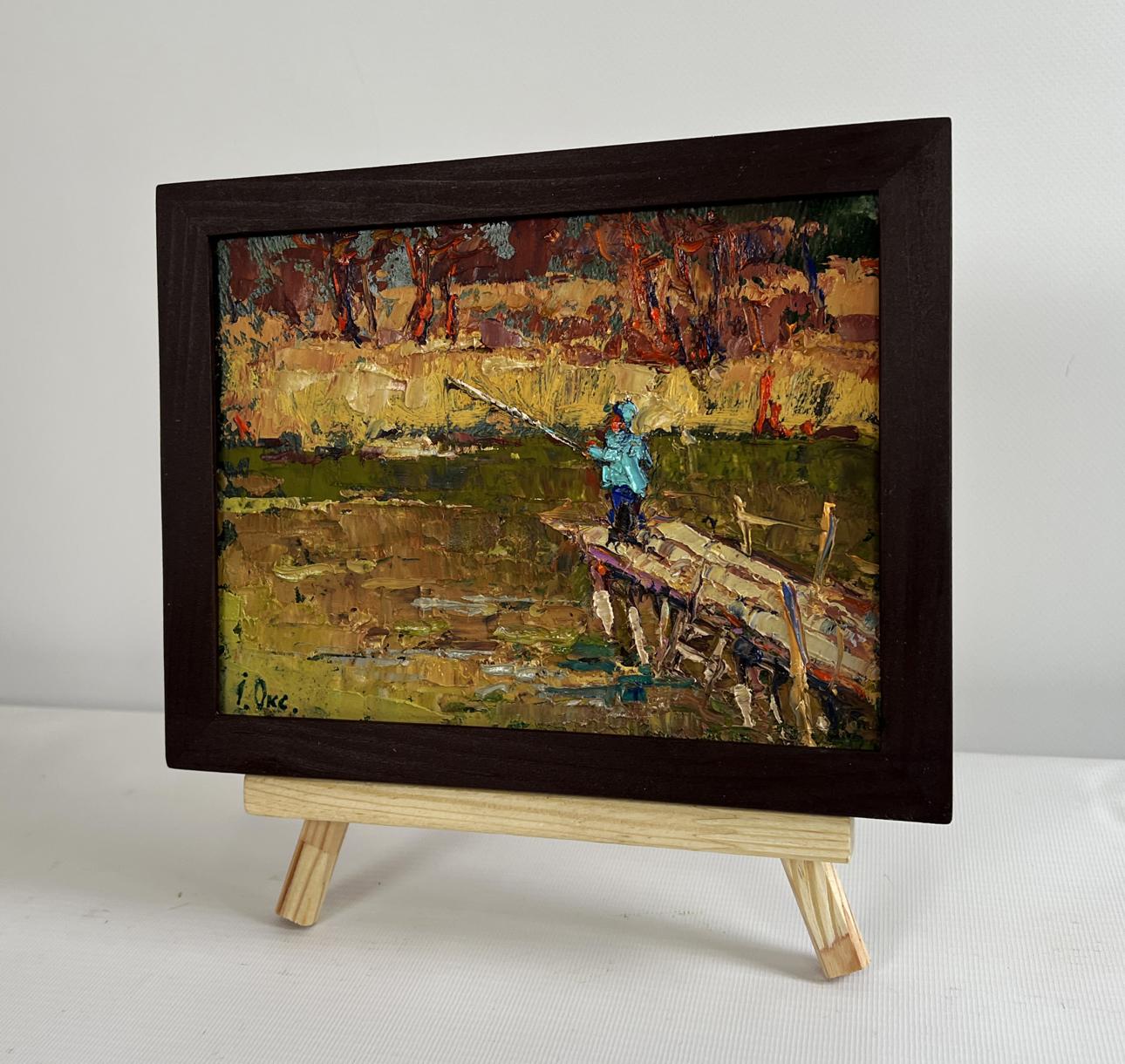 Oil painting The Lonely Fisherman by Oksana Ivanyuk on wooden pier