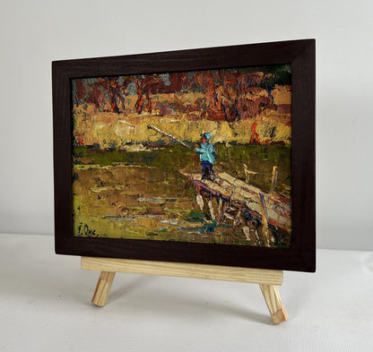Oil painting The Lonely Fisherman by Oksana Ivanyuk on wooden pier