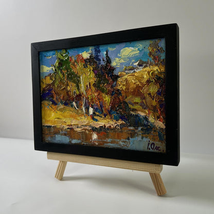 Oil painting Over the River by Oksana Ivanyuk in black frame