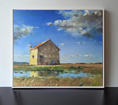 Oil painting Heavenly Mood by Volodymyr Gluhomanyuk: yellow barn, blue sky