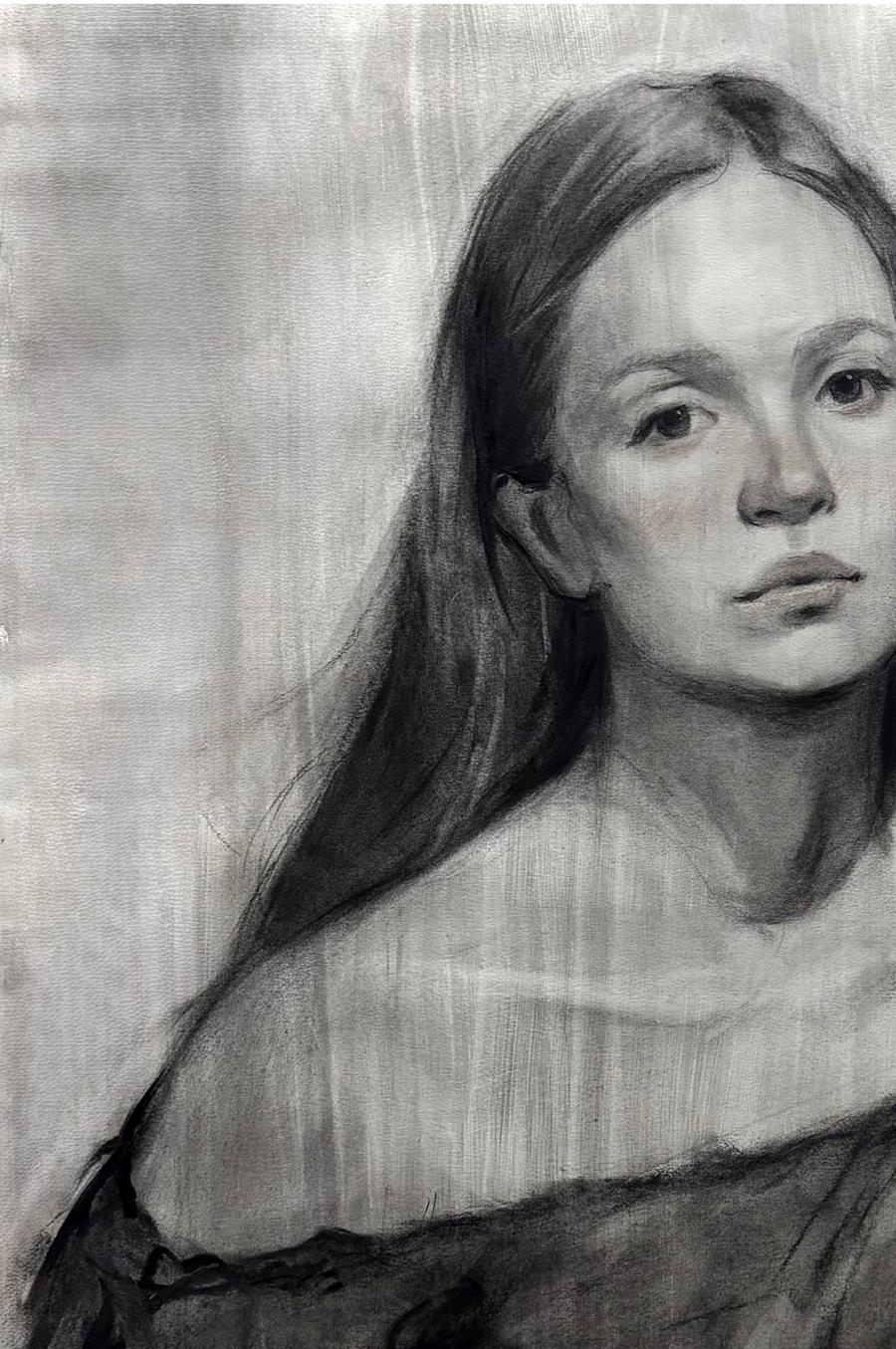 Detailed charcoal portrait sketch of Mariia Annam Butt with long dark hair