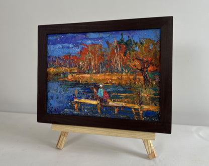 Oil painting Autumn mood near the river by Oksana Ivanyuk, serene autumn dock scene