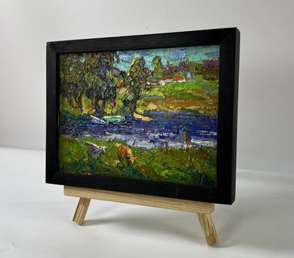 Oil painting Near the river by Oksana Ivanyuk, cows by blue river