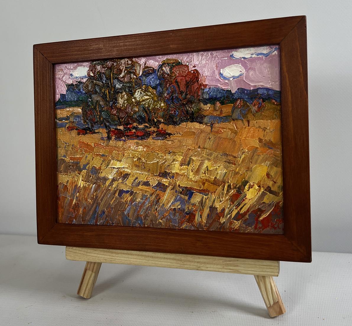 Oil painting On the autumn steppes by Oksana Ivanyuk, golden field under pink sky