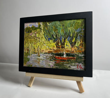 Oil painting Summer boat vacation by Oleksiy Ivanyuk in black frame
