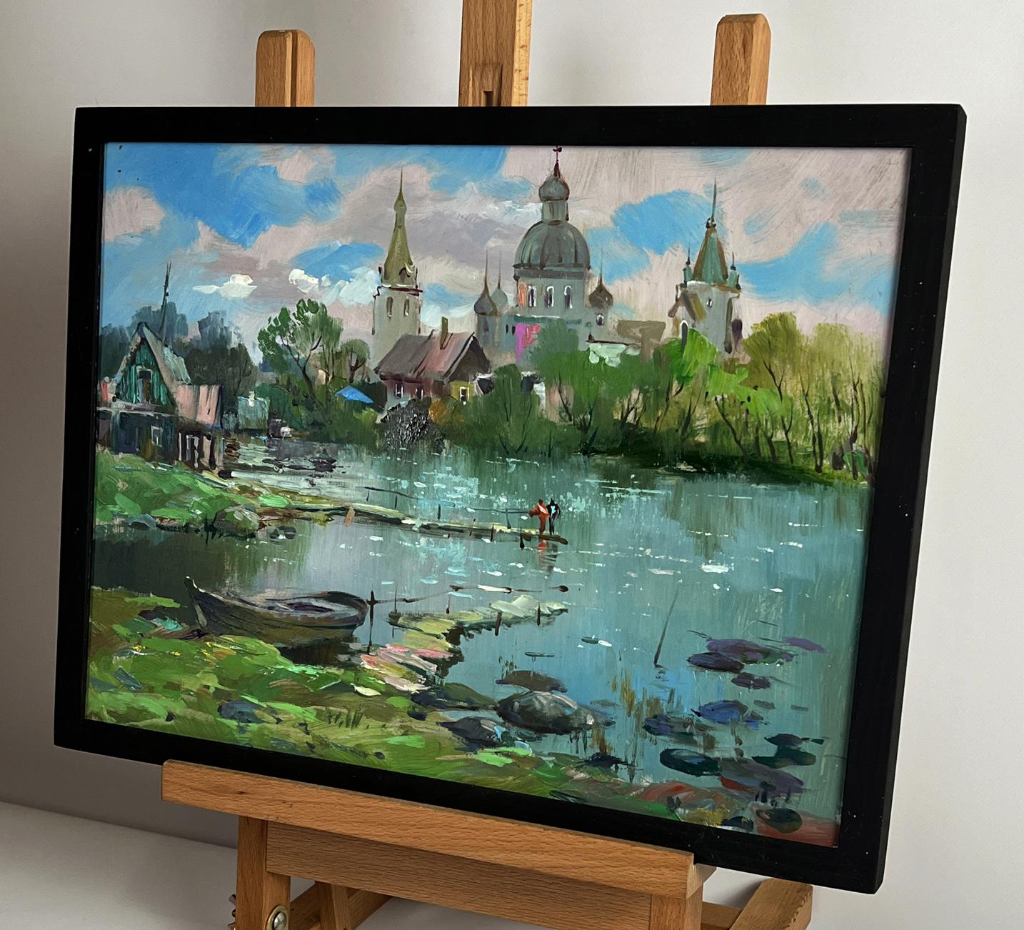 Framed oil painting of riverside village by Yuriy Suprunchuk