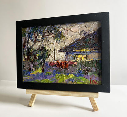 Oil painting Saturday night at home by Oksana Ivanyuk in black frame