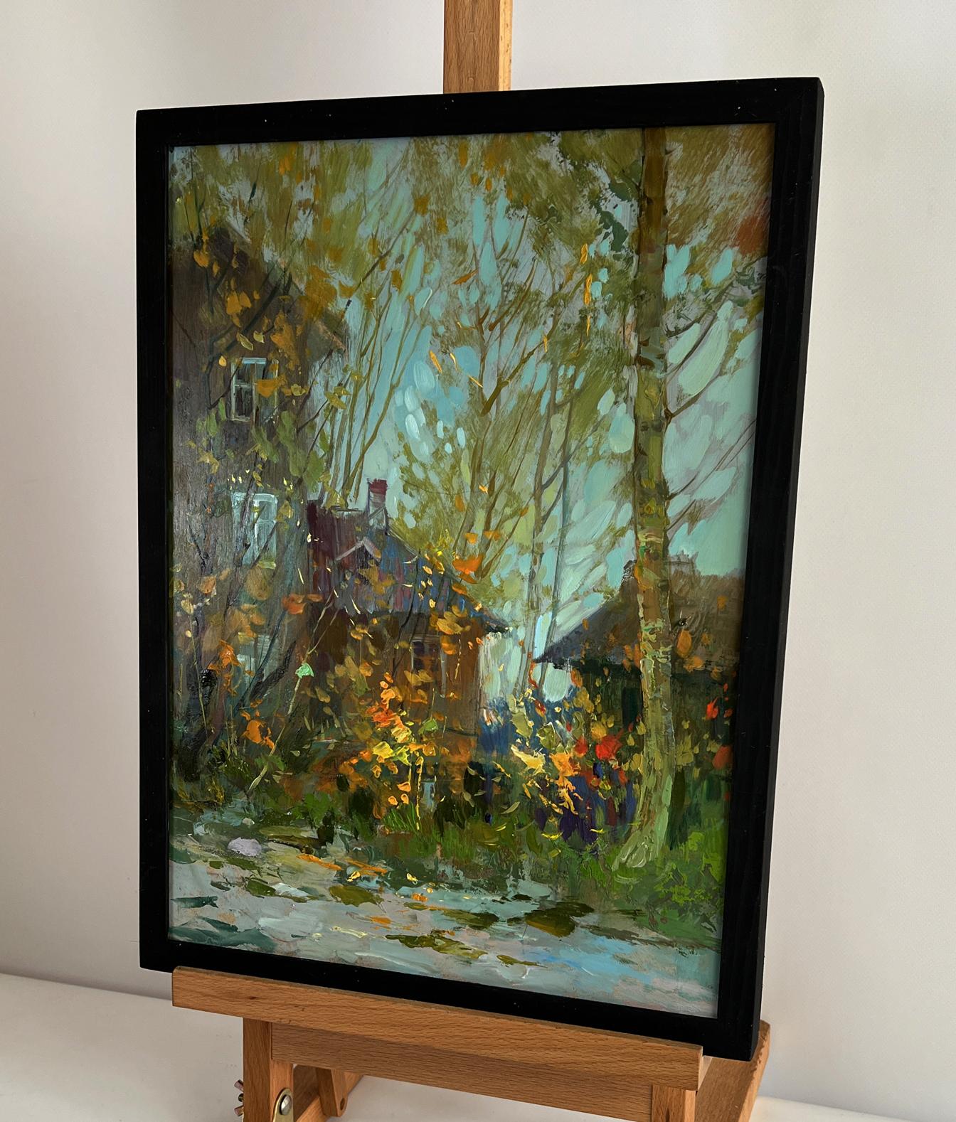 Oil painting of autumn old town street by Yuriy Suprunchuk in black frame