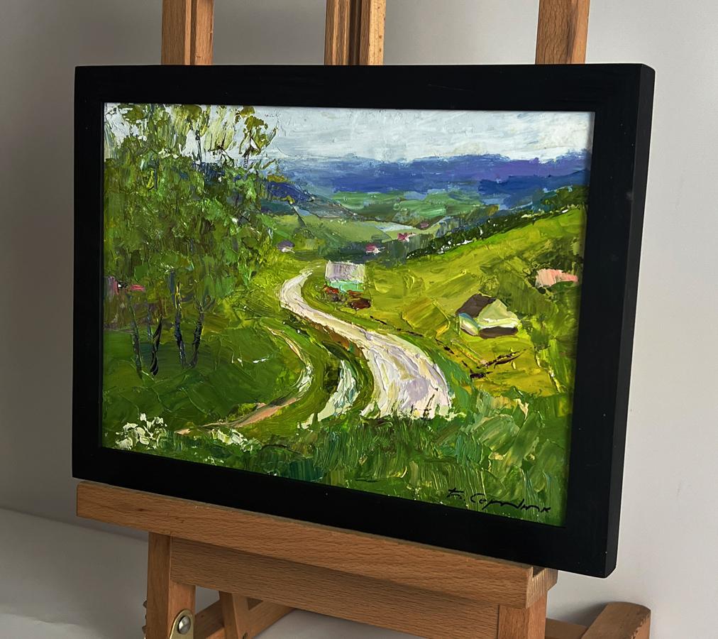 Black-framed oil painting of Boris Serdyuks wavy mountain road